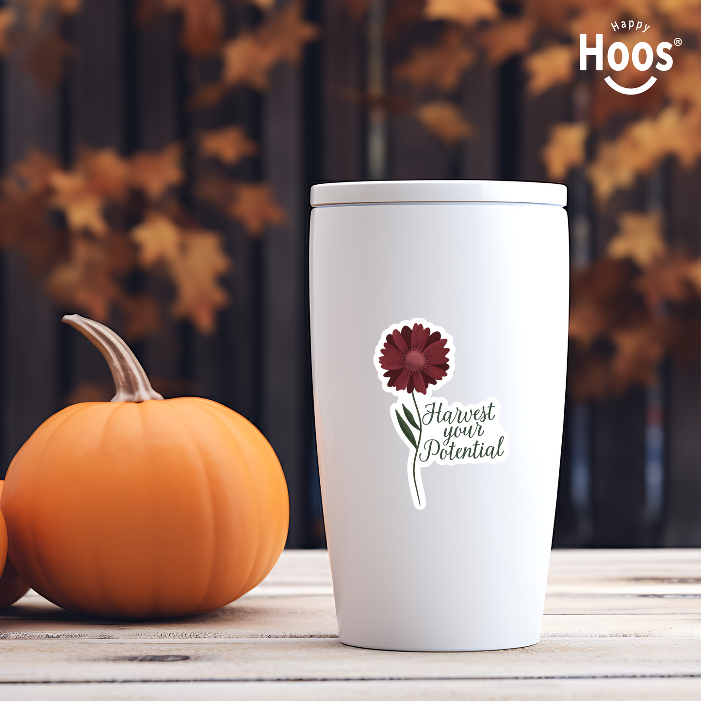 White tumbler with Harvest Your Potential sticker featuring a deep burgundy gerbera daisy with detailed petals and green stem and leaves, with dark script lettering reading "Harvest your Potential" beside the flower, measuring 2.5 by 3.5 inches