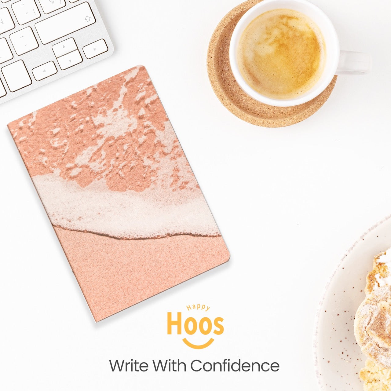 Notebook with pink marble design on a desk with a cup of coffee and food.