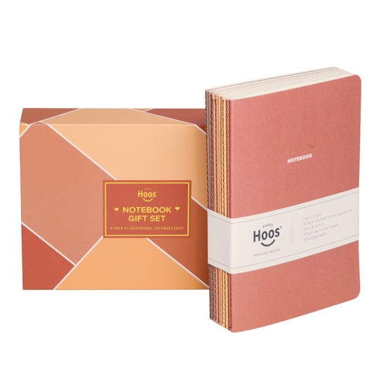 8 fall themed notebooks with a geometric-patterned box labeled 'Happy HOOS Notebook Gift Set' on a white background.
