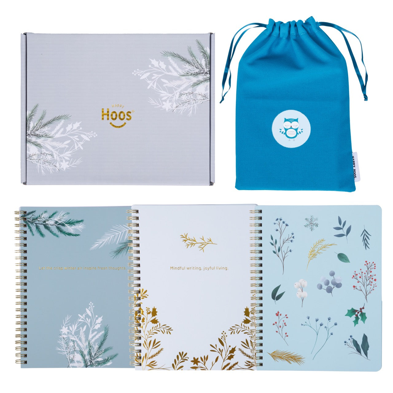 Three notebooks with winter themed floral designs, a box, and a blue drawstring bag on a white background