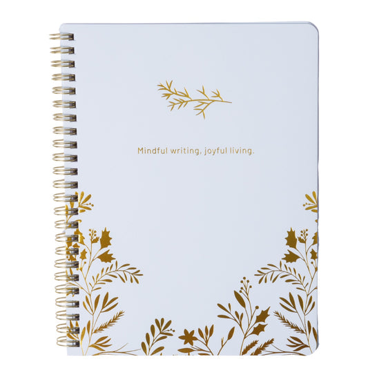 Notebook with gold leaf designs and 'Mindful writing, joyful living' text on a white background