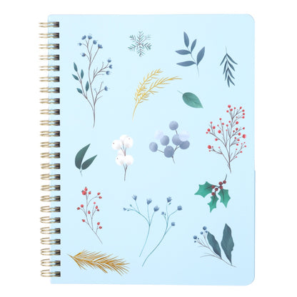 Notebook with floral illustrations on a light blue background