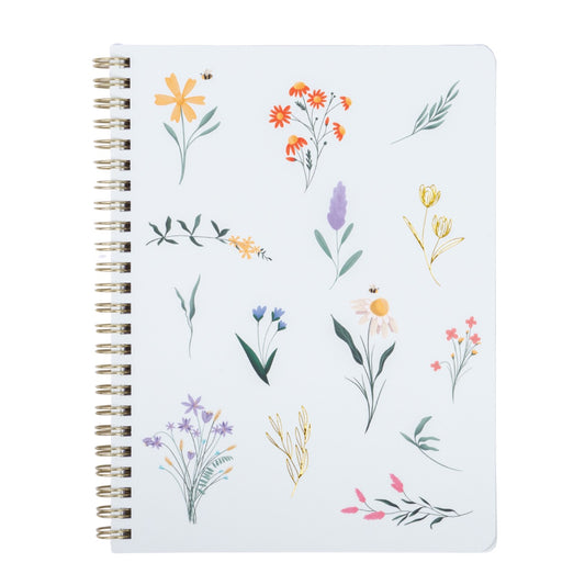Notebook with floral design on a white background
