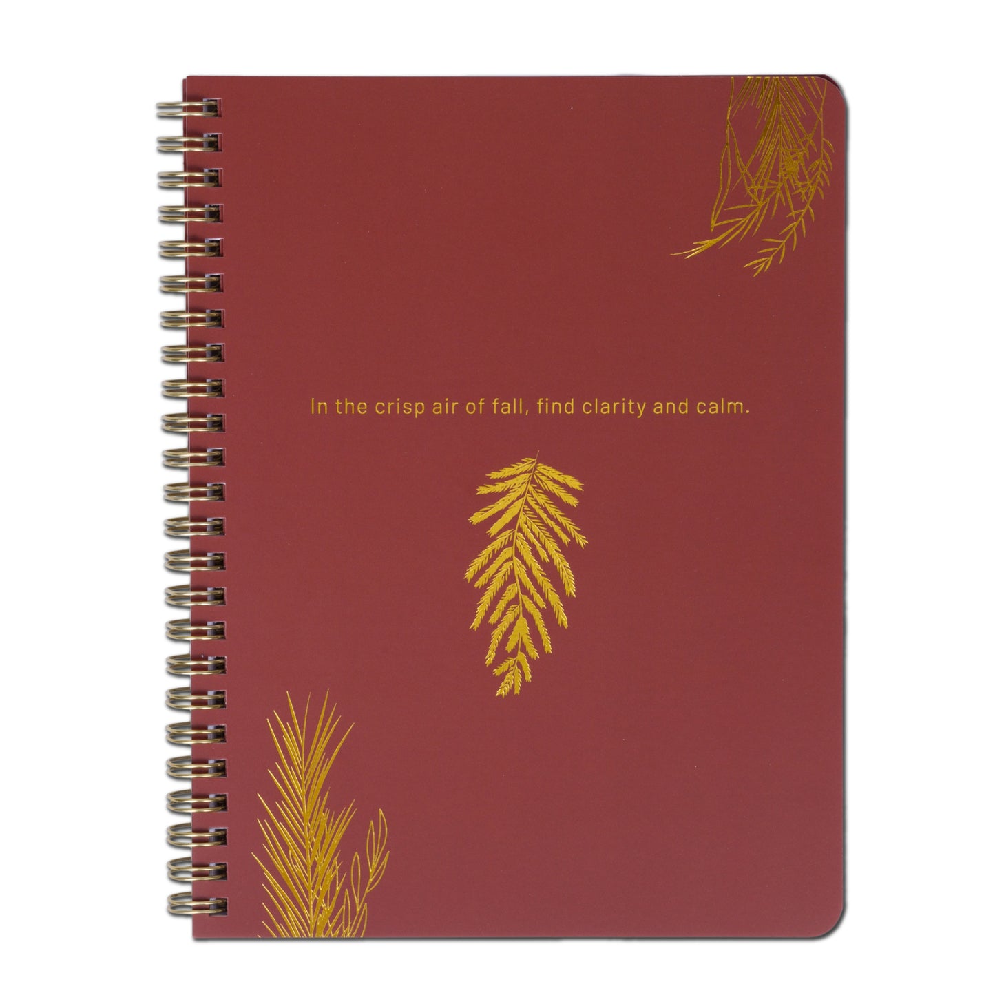 Red notebook with gold leaf designs and text on a white background