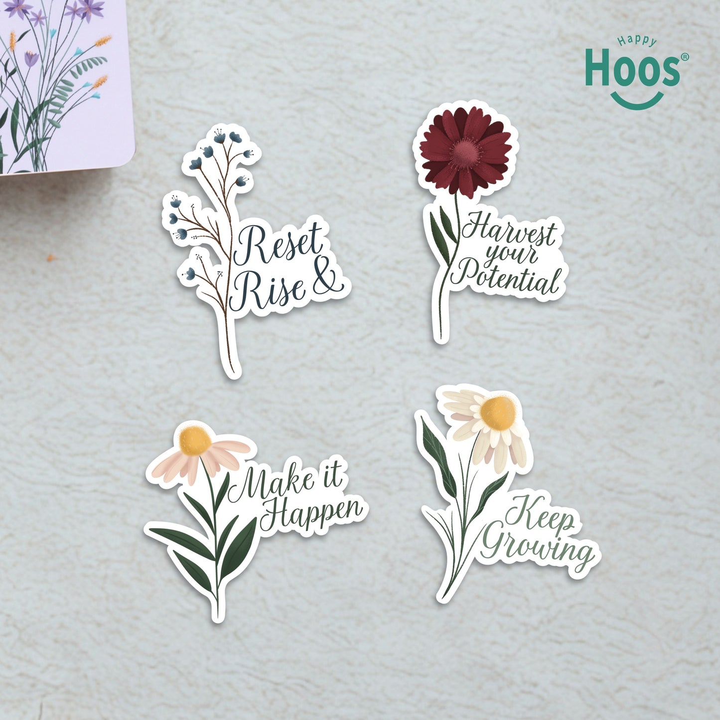 Four flower stickers on textured surface: 'Reset Rise &', 'Harvest your Potential', 'Make it Happen', and 'Keep Growing' with motivational messages