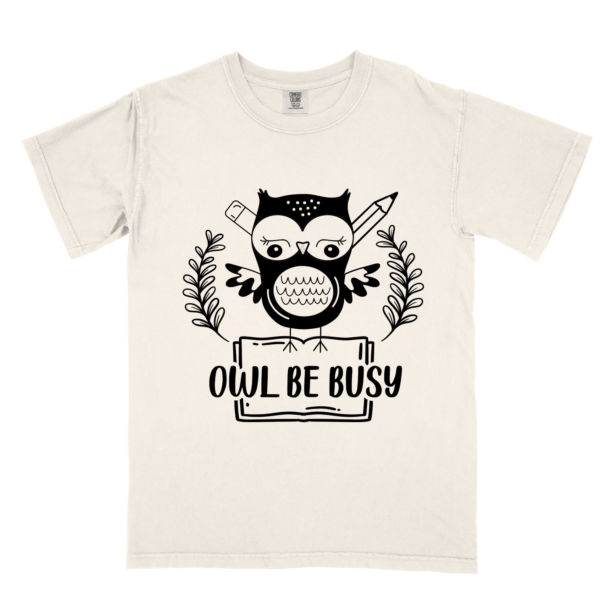 a beige t-shirt with an owl graphic and 'OWL BE BUSY' text.
