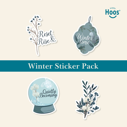 Winter Sticker Pack featuring blue berry branches with "Reset & Rise", ornament with eucalyptus and "Winter time", snow globe with "Quietly Becoming", winter botanical bouquet with berries