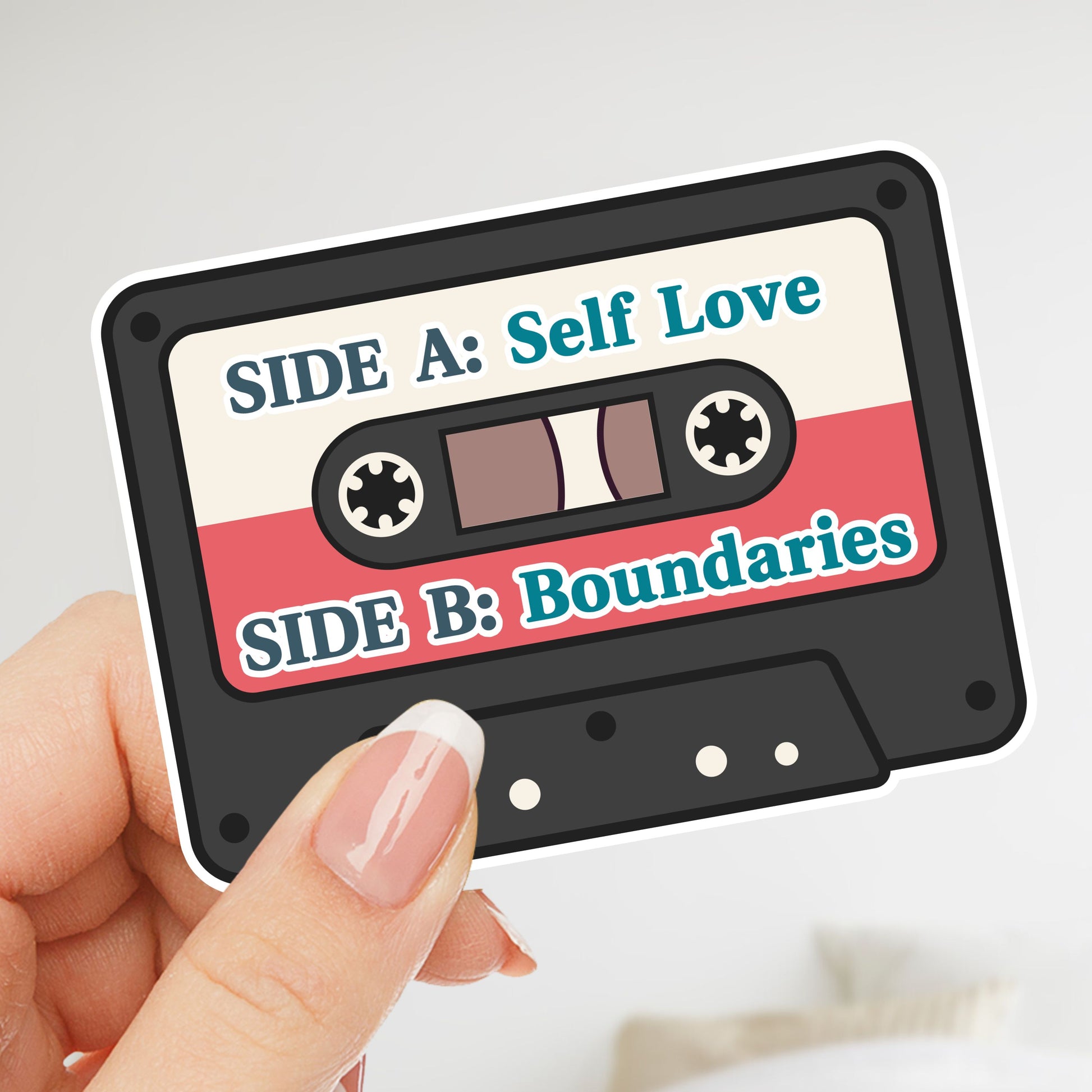 Cassette tape design with 'Side A: Self Love' and 'Side B: Boundaries' text held by a hand.