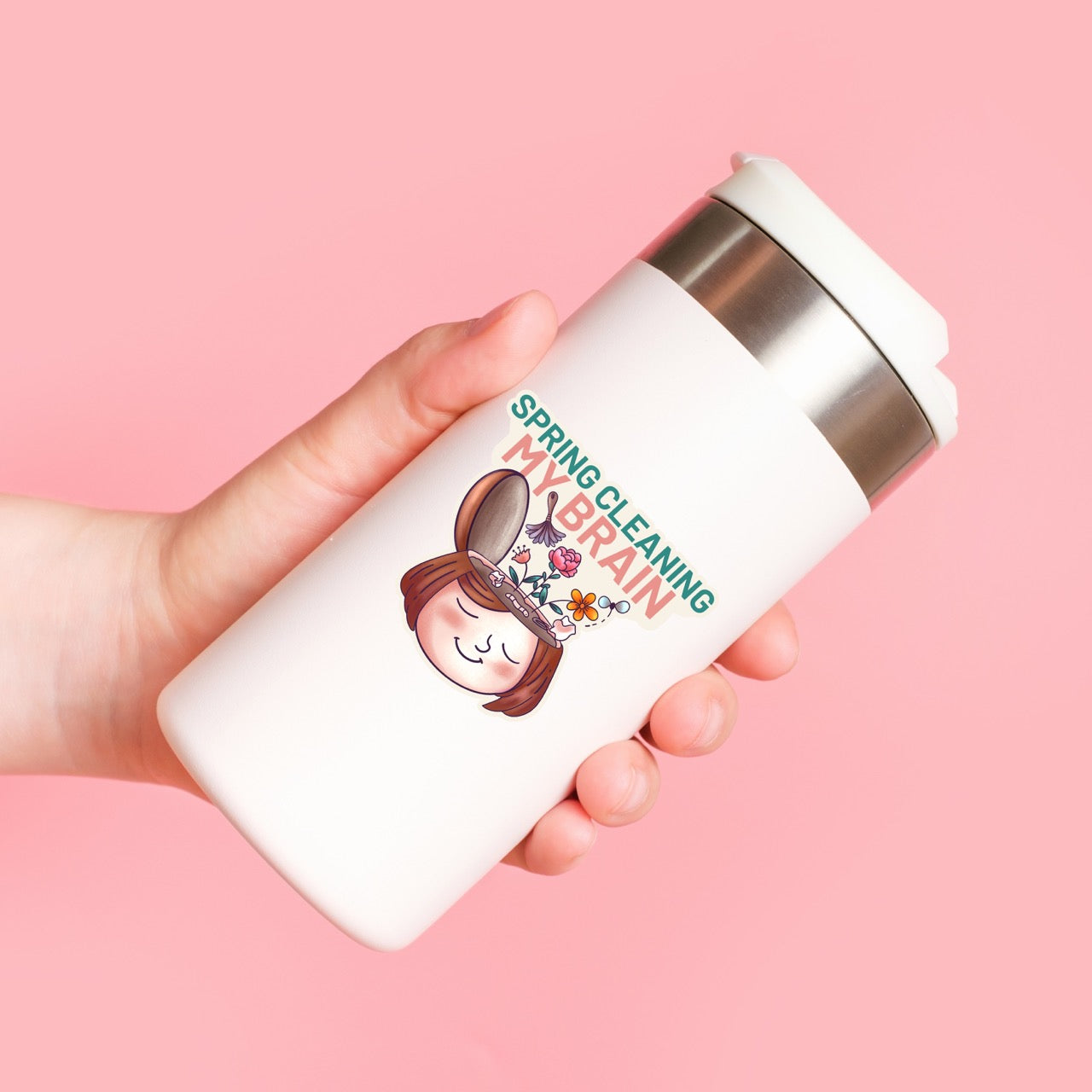 Spring Cleaning My Brain waterproof sticker on a water bottle featuring a smiling face with flowers growing from an open head, made for self care, overthinkers, mental reset, planners, laptops, and water bottles.